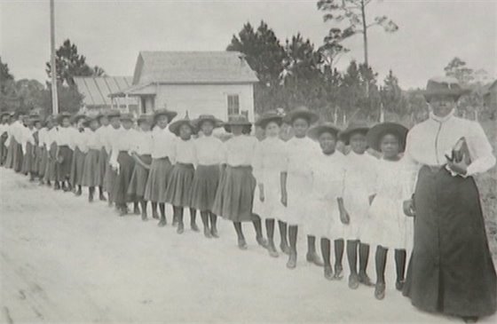 Decorative image showing Mary McLeod Bethune with children