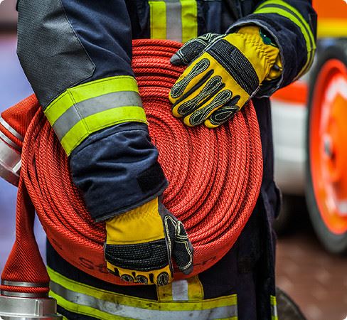 Fire Fighter Holding Hose